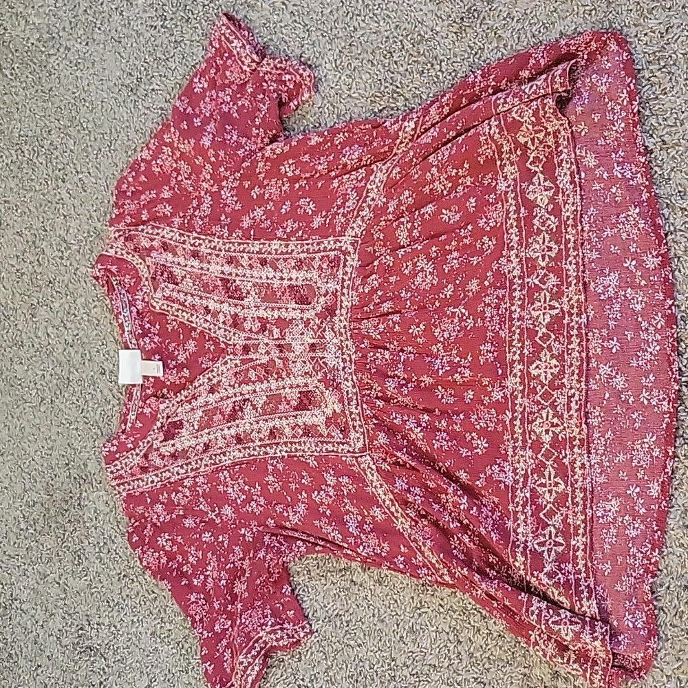 Red floral blouse